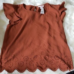 Burnt orange blouse